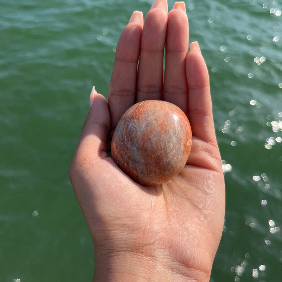 Peach Moonstone Palm Stone